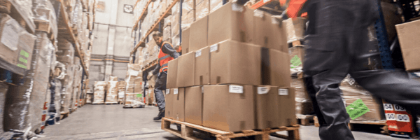 Warehouse workers working on stocking product for major retailers