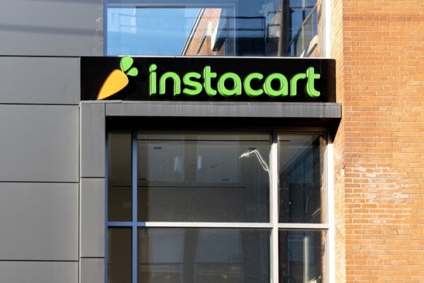 Instacart company closeup sign is seen in Toronto, Canada. Instacart is an American company that operates a grocery delivery and pick-up service.