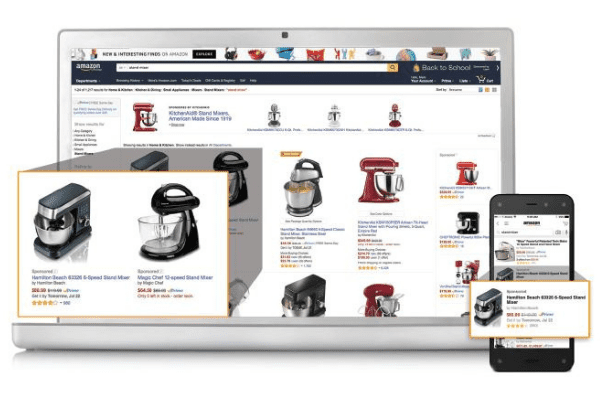 Amazon sponsored ads on the laptop and smartphone show a customer searching for a kitchen mixer.