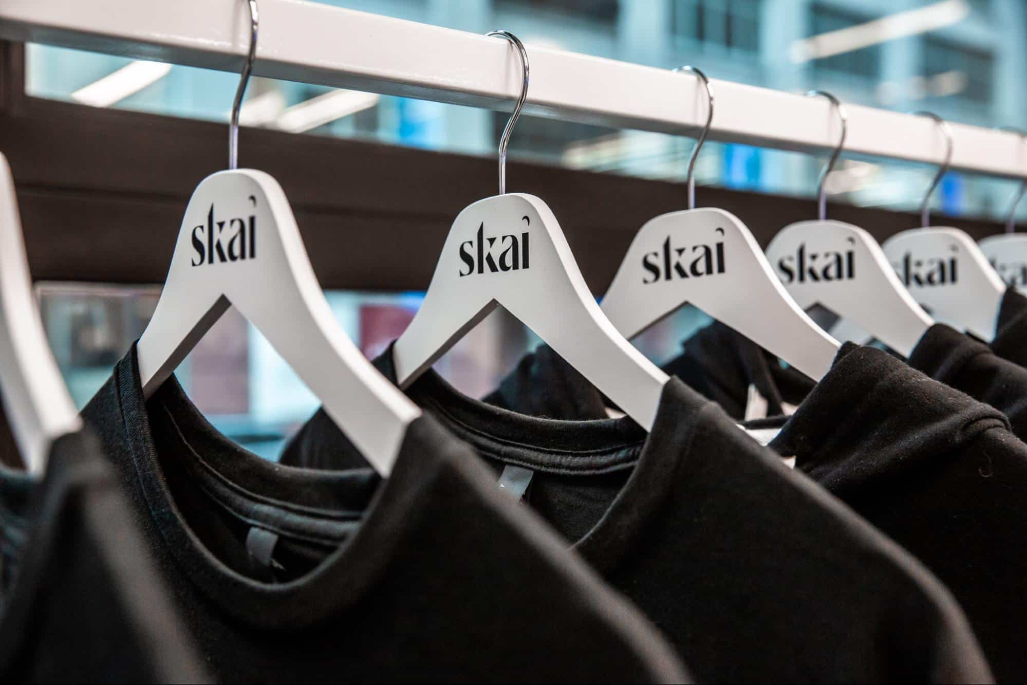 Skai merchandise and branded hangers on display at ShopAble conference.