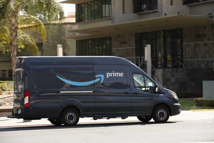 An Amazon Prime truck makes a delivery during Prime Day.