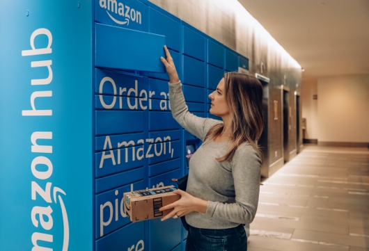 Woman dropping off an Amazon return at an Amazon Hub